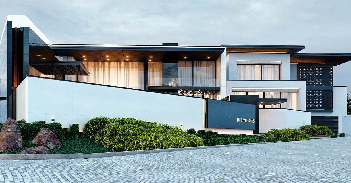 Casa contemporánea con fachada sobria y vegetación